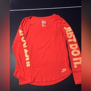 Dark pink Nike shirt